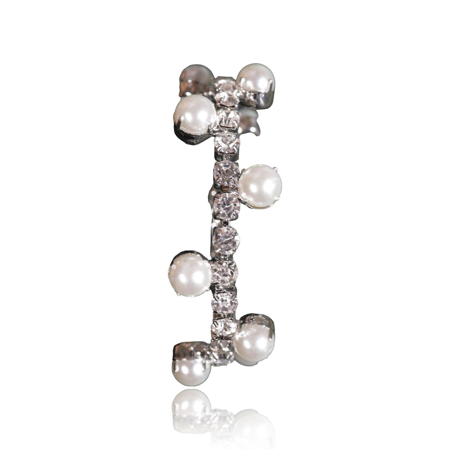 The Silver Pearl and Crystal Hoops showcase a vertical line of clear white stones with small round pearls along both sides, set on a silver base against a white background.