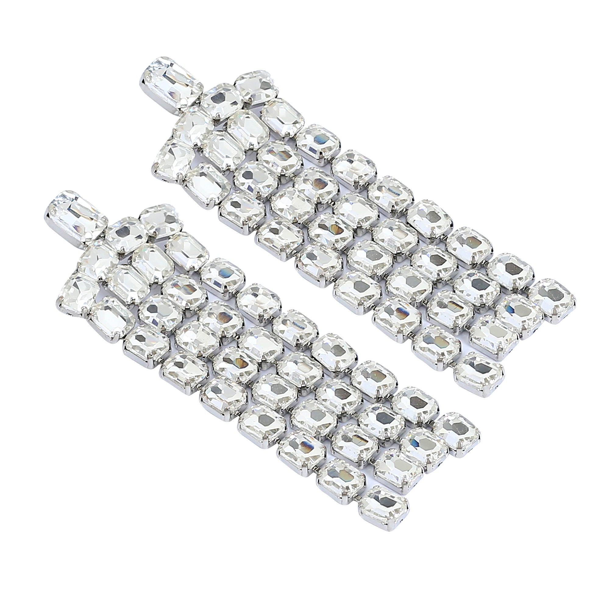 The Long Rhinestone Tassel Earrings feature rectangular, dangling rows of sparkling lab-created stones set in silver-tone metal for a luxurious, elegant look.