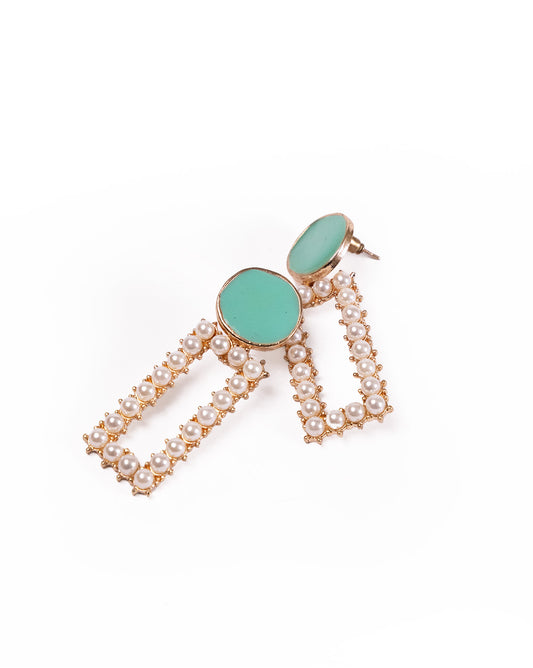 The Teal a Pearl Earrings are gold-tone brass alloy earrings with round turquoise studs and rectangular dangle frames accented by small white pearls, shown against a white background.