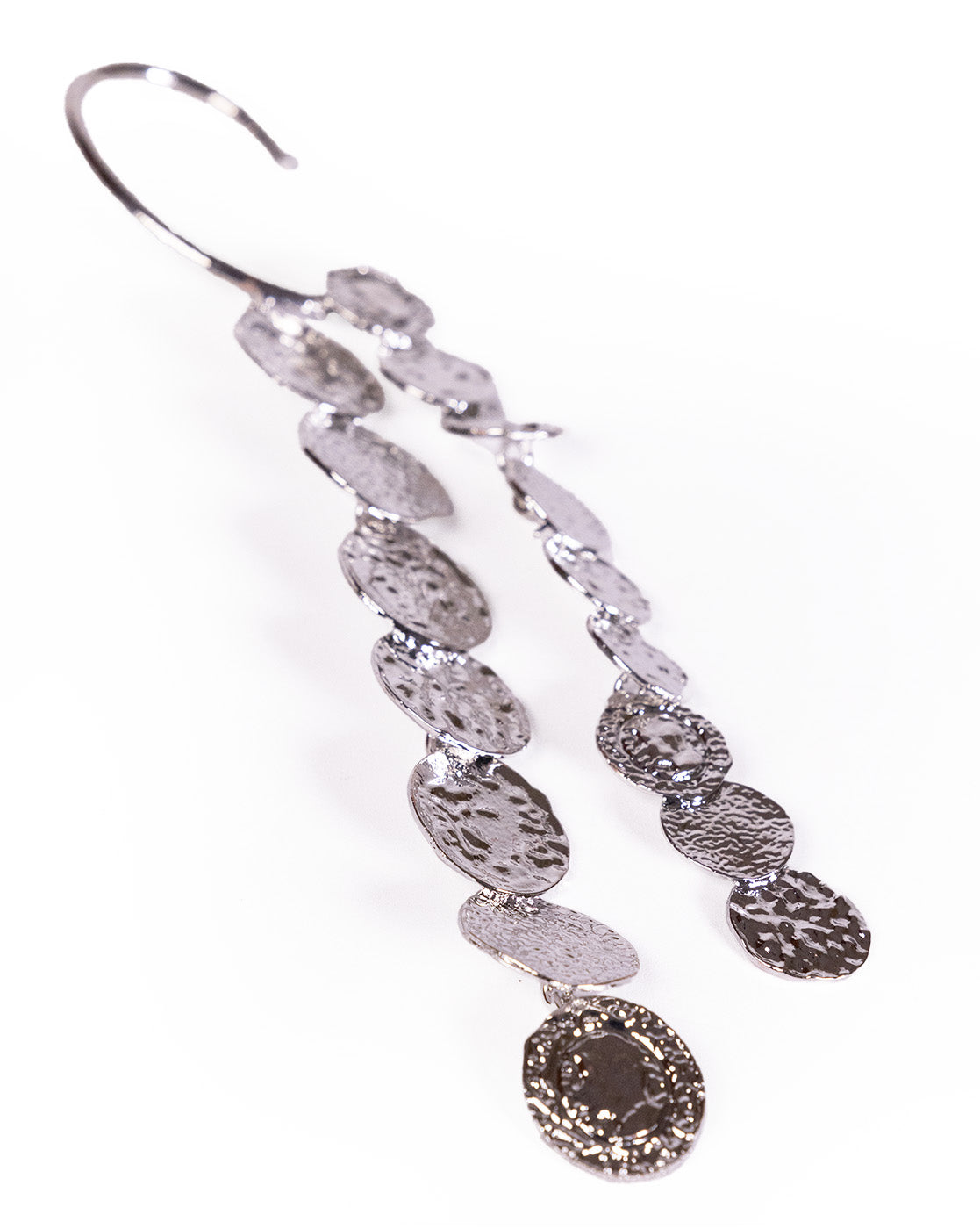 The Silver Ear Cuff (right ear) is a long, silver dangle ear cuff with two rows of textured, oval-shaped metal discs, shown on a white background.