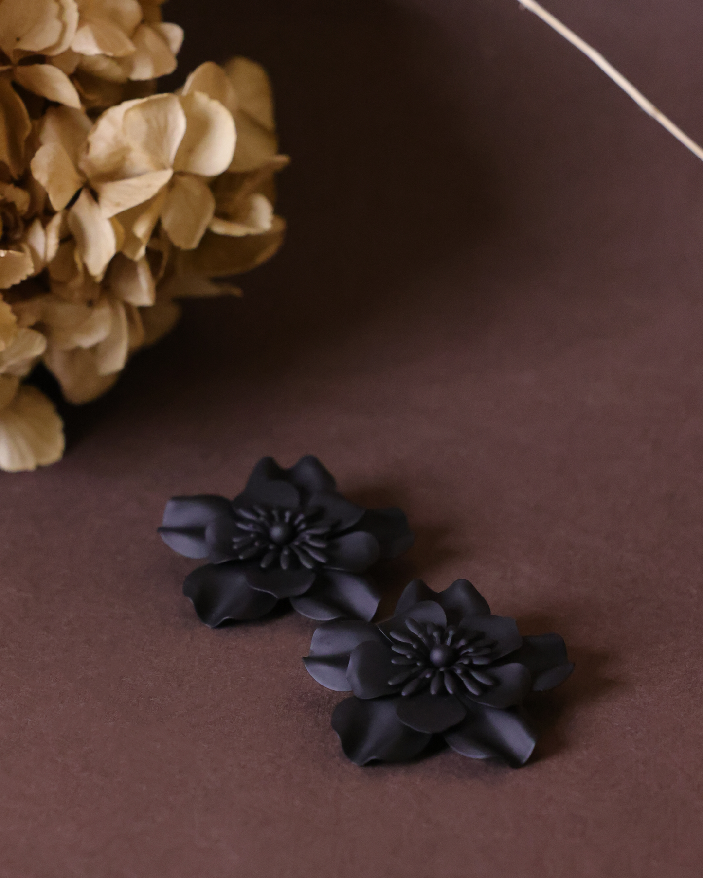 Large black flower earrings