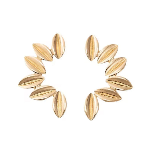 Ten shiny 24K gold plated leaf earrings arranged in a circular, heart-like pattern on a white background.
