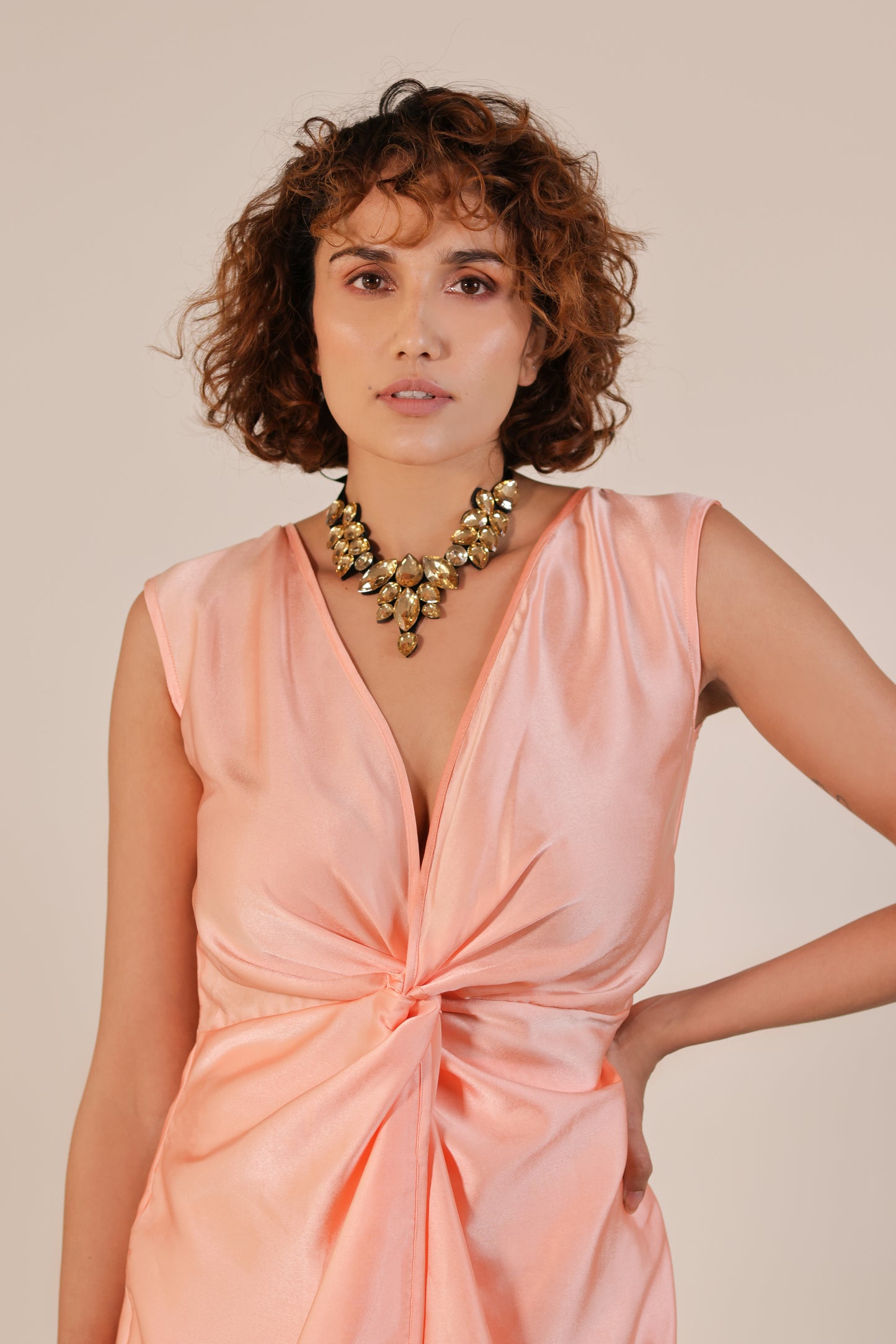 Model with tie necklace yellow