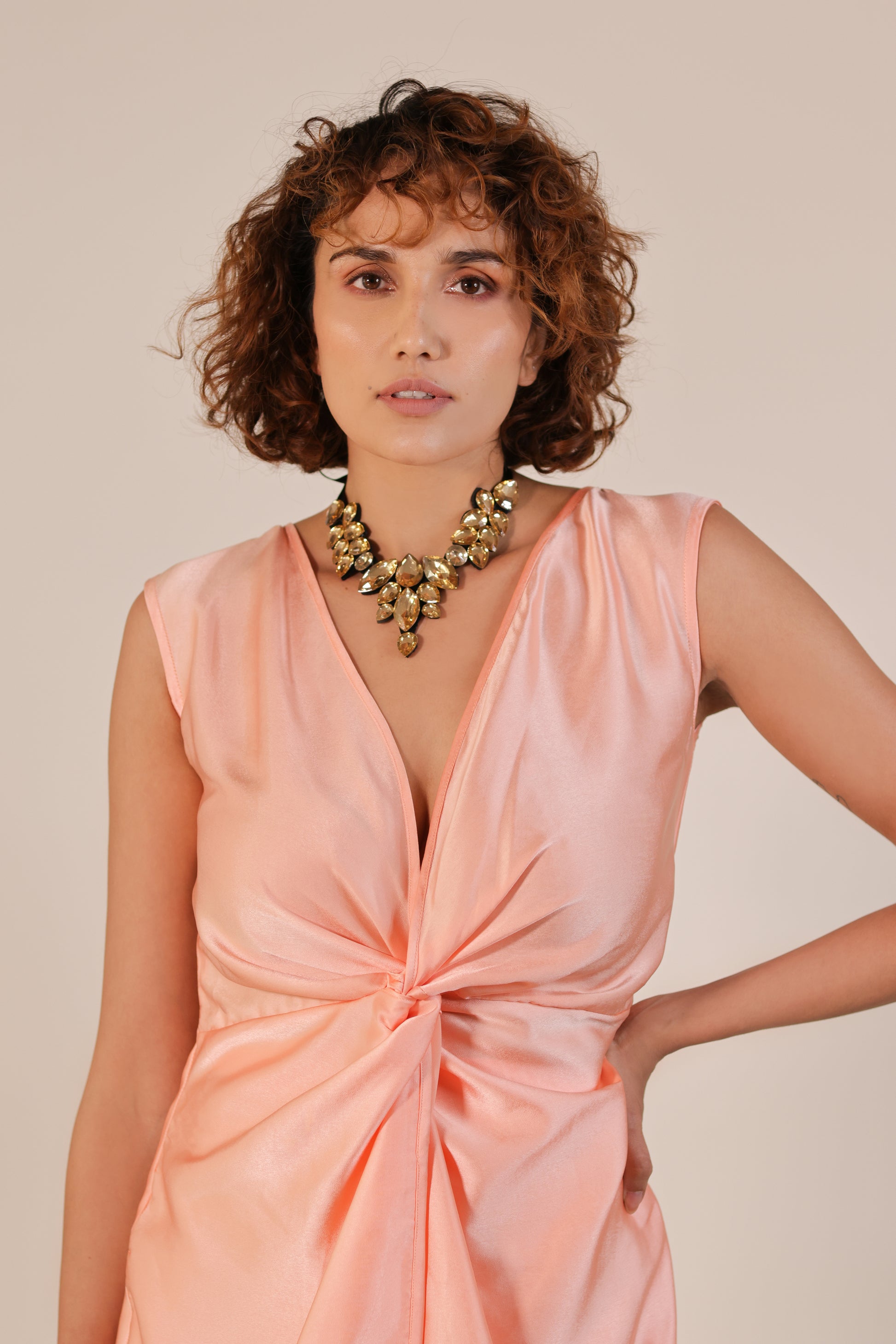 Model with tie necklace yellow